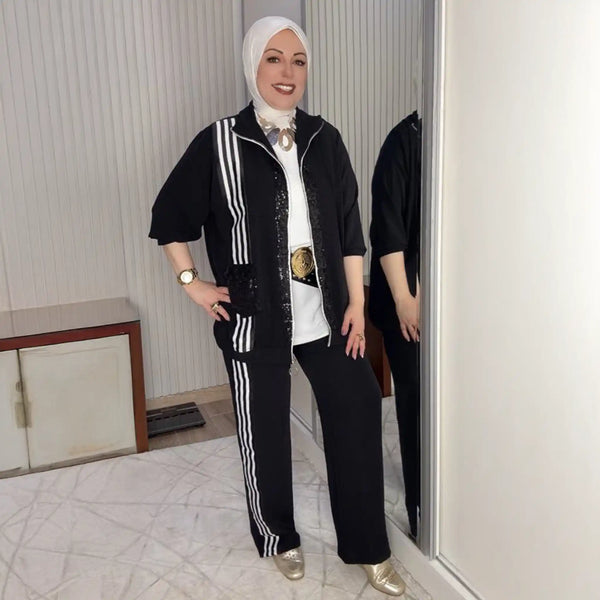 بلوزة من الكريب باللون الأبيض العاجي