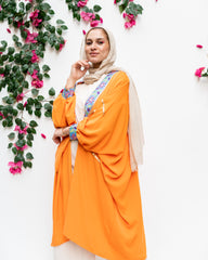 Orange open poncho with Indian tape