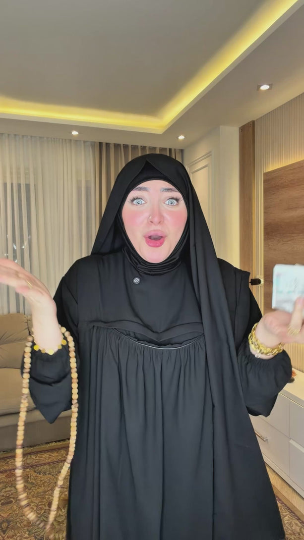فيديو عباية العمرة بالجيب السحري أسود